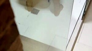 I watch my perverted stepmom shaking her thick ass in the shower to seduce me while spying on her bath