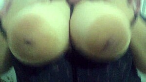 Redhead milf watches hentai, toys big tits