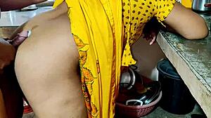 Hey, that bhabhi getting rough doggystyle fucking in the kitchen with big tits and monster cock...