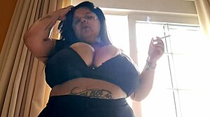 Provocative BBW Latina Flashes Huge Tits Smoking in Motel Window